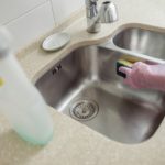 Cleaning a stainless steel sink