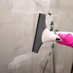 Using a shower squeegee