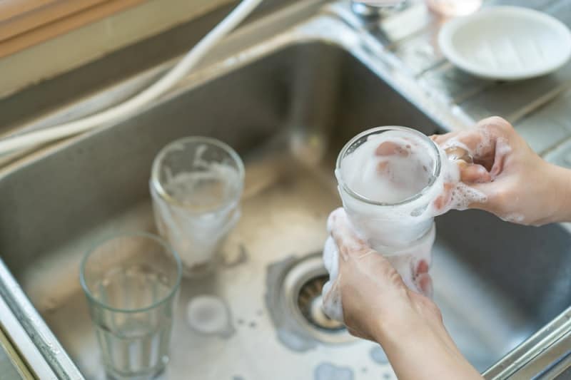 Washing glasses by hand