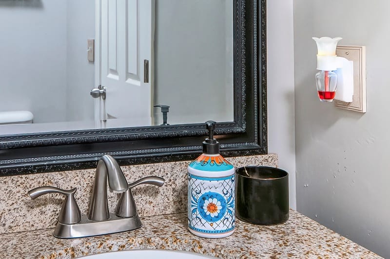 Plug in air freshener in bathroom