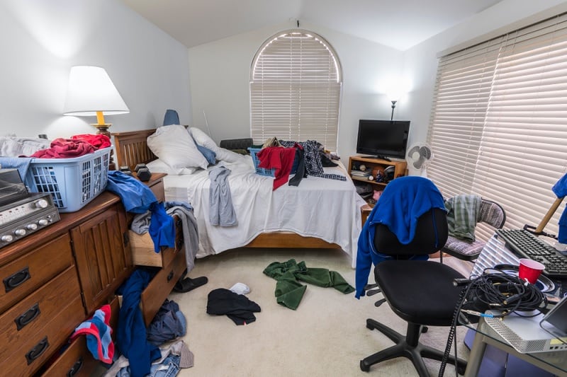 Untidy cluttered bedroom