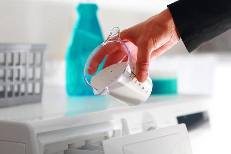 Laundry detergent in dosing cup