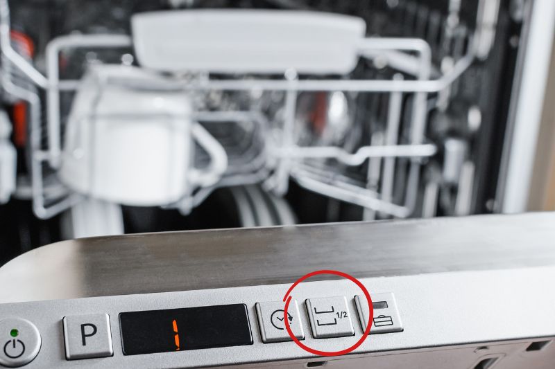 Half load button on dishwasher