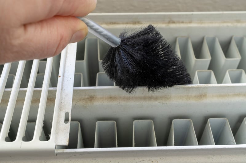 How to Clean Behind Radiators