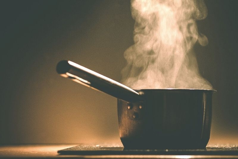 Steaming hot pan of water