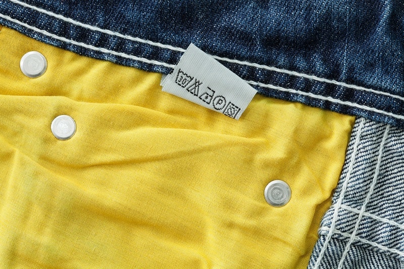 Clothing care label on jeans