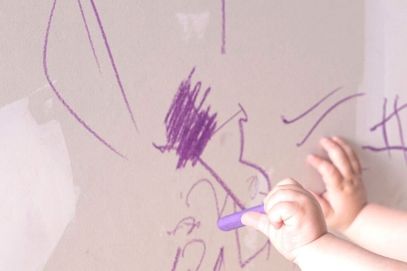 Kid Drawing on Walls