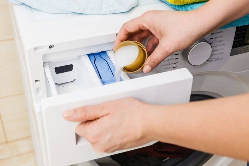 Here's what those compartments actually do in your washing machine drawer