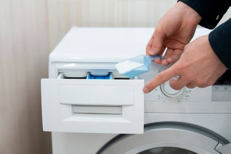 Here's what those compartments actually do in your washing machine drawer