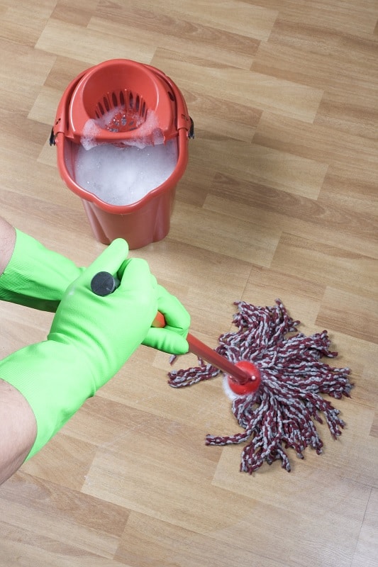 Mopping a wood parquet floor