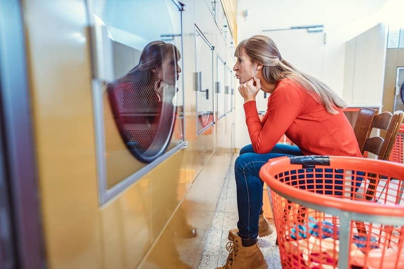 Waiting for clothes at launderette