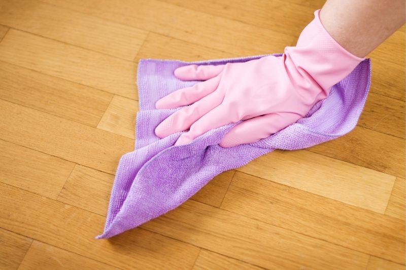 Wiping Laminate Floor with Cloth