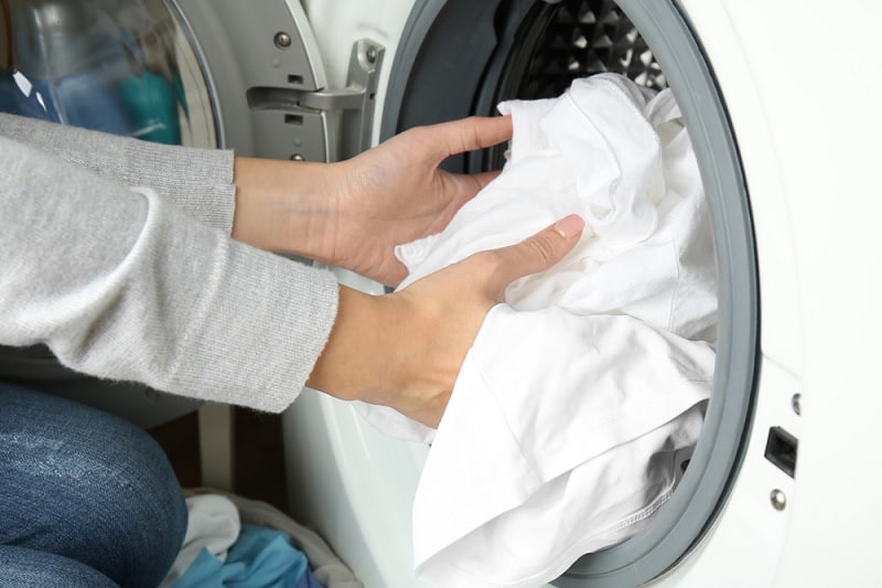 Taking white clothes out of washing machine