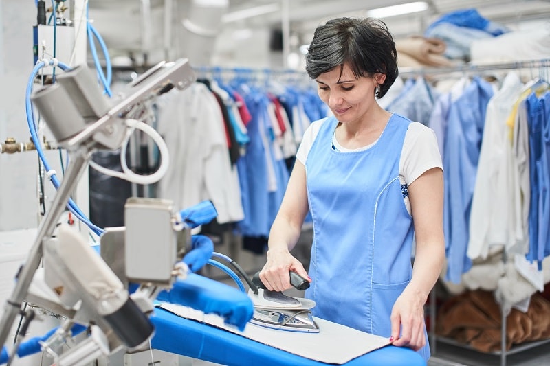 woman doing ironing services