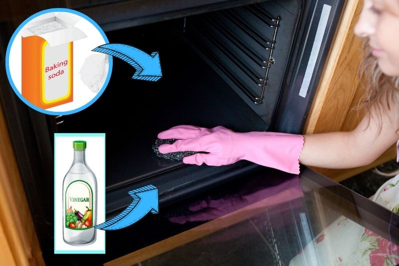 woman cleaning the inside of oven