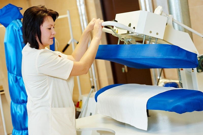 woman doing ironing services