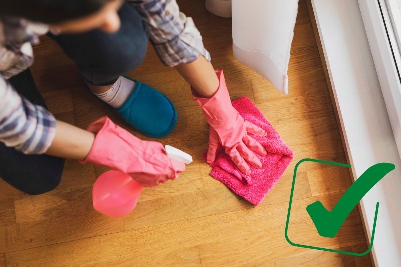 clean solid wood floor with floor cleaner