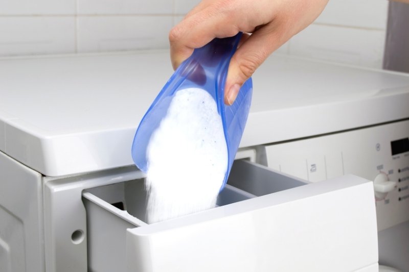 adding too much detergent in washing machine