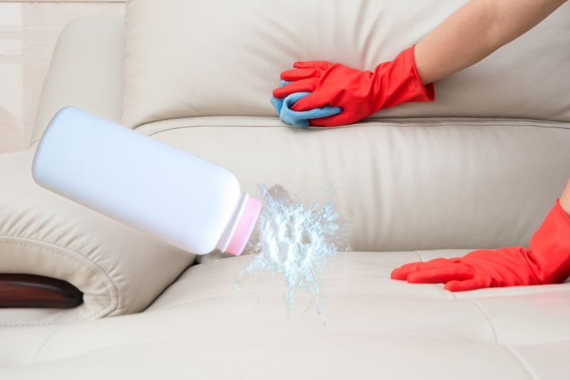 remove grease from leather sofa with talcum powder
