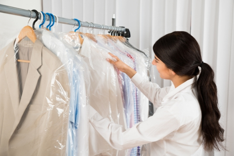 packing clothes in dry cleaning