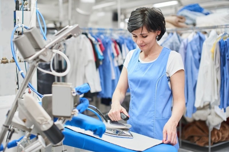 pressing clothes in dry cleaning