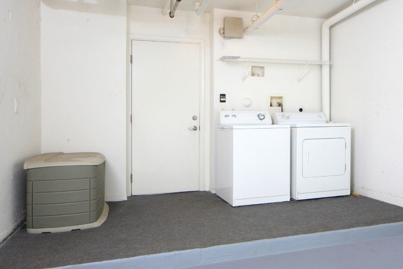 washing machine and tumble dryer in garage