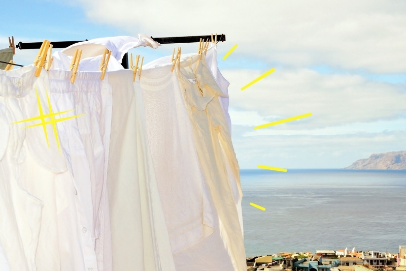 Drying clothes under online the sun