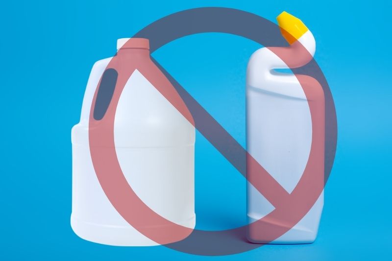 Bleach and Toilet Cleaners in blue background