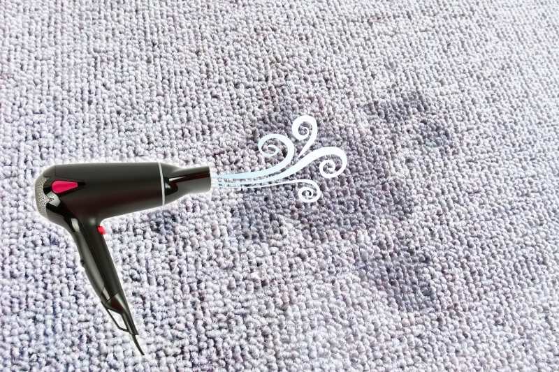 drying wet carpet with hair dryer