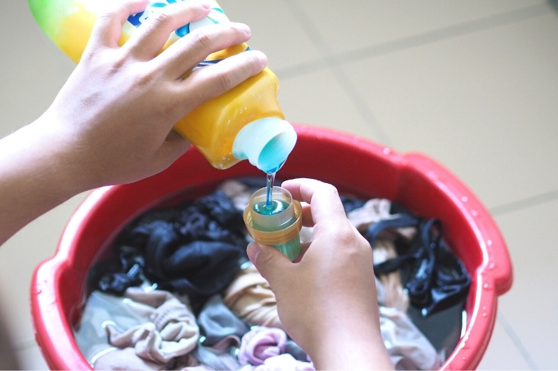 hand washing clothes with fabric conditioner