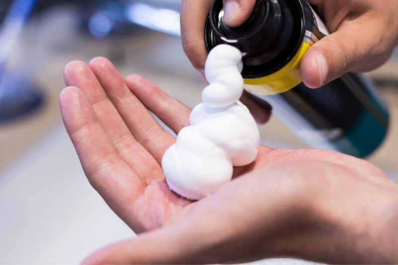 shaving foam on hand