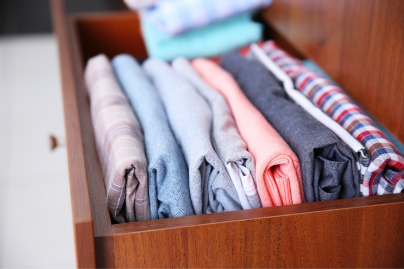 folded clothes in drawer