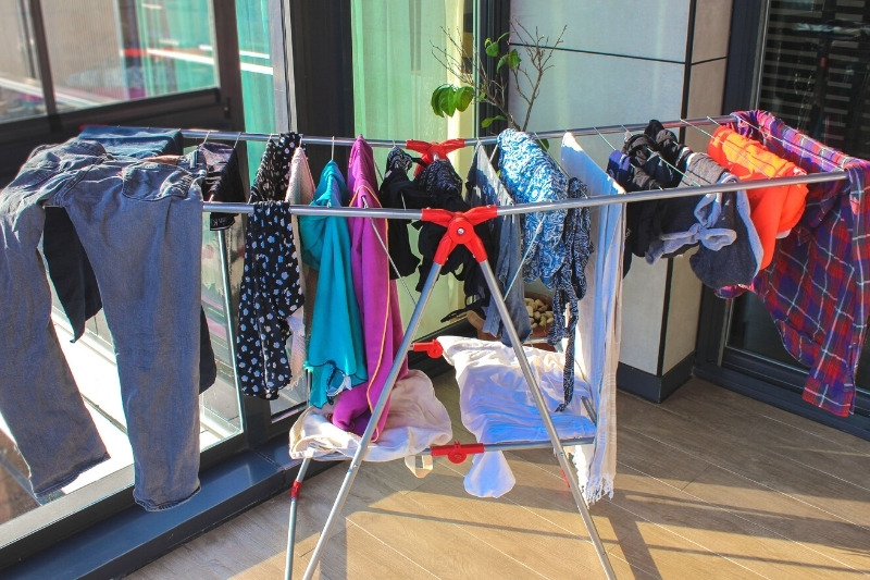 When hang-drying clothes, which is faster, indoors or outdoors