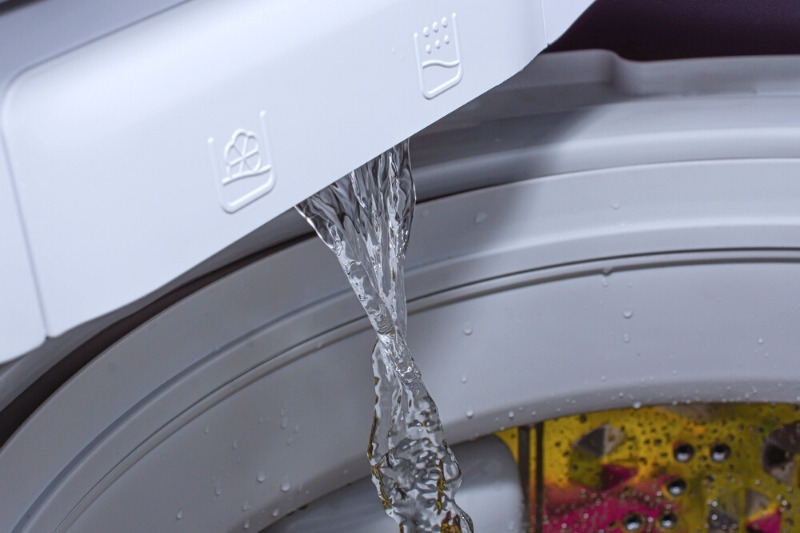 putting water in washing machine