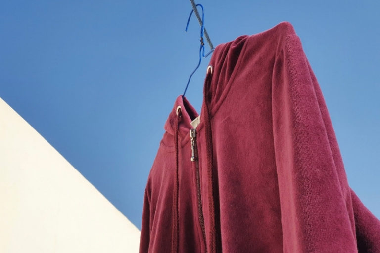Should You Wash Hoodies Zipped or Unzipped?
