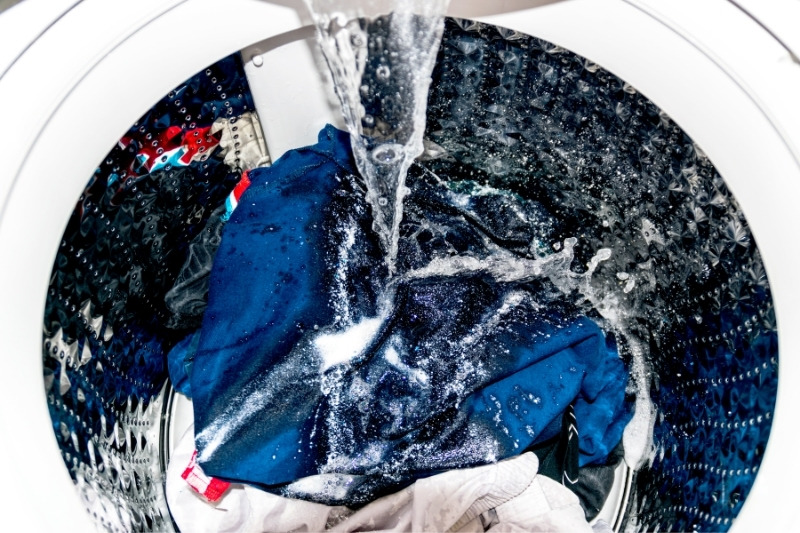 water in washing machine laundry