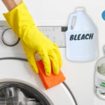 bleach or vinegar for cleaning the washing machine