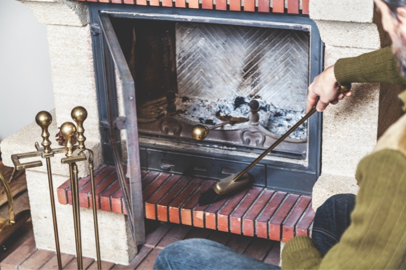 brushing up stone fireplace