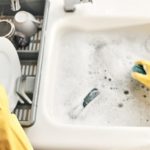 Washing dishes with gloves