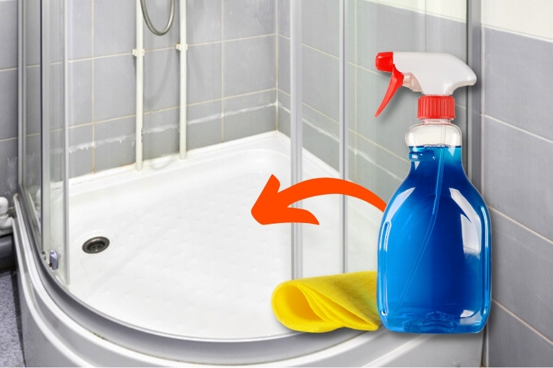 clean shower tray with bathroom cleaner