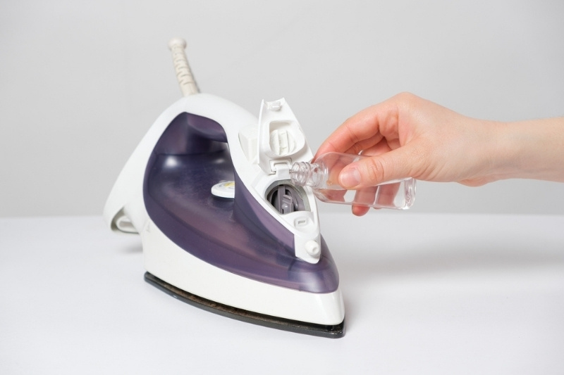 pouring ironing water
