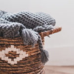 wool blanket in laundry basket