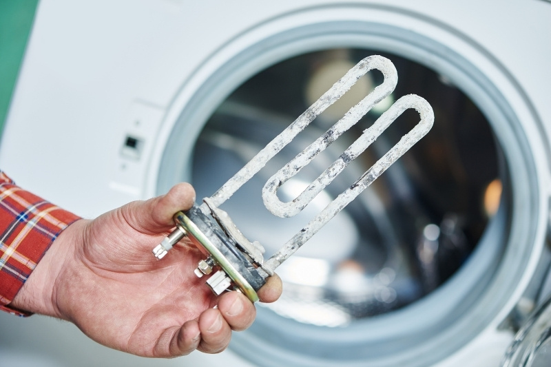 washing machine heats own water