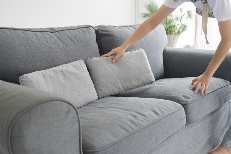 Arranging sofa cushions