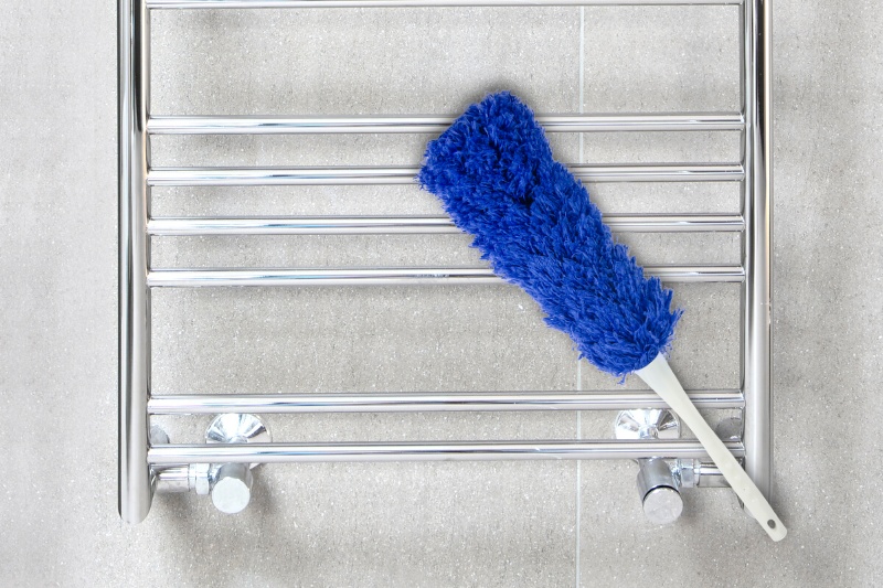 cleaning towel rail with duster