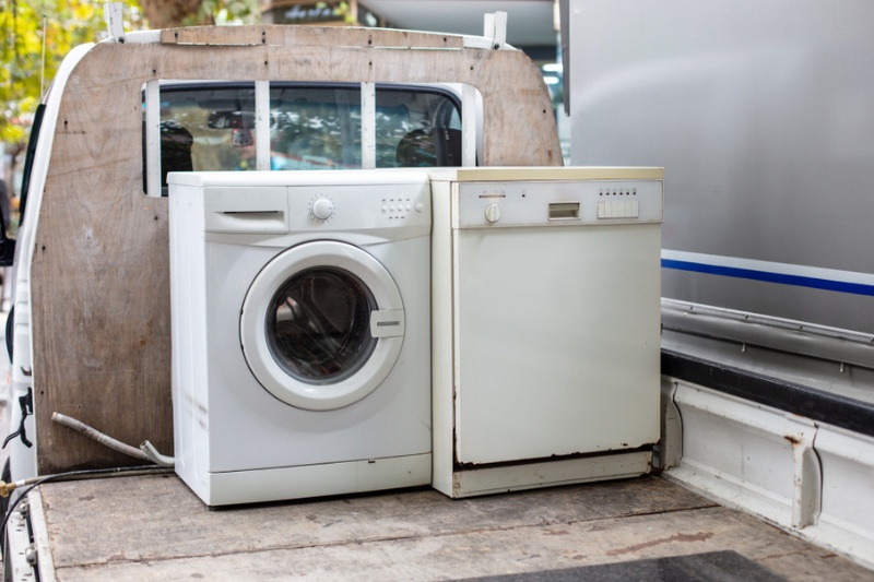 old washing machine on truck