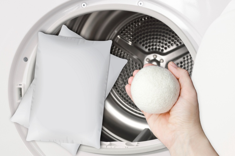 pillows and dryer balls in tumble dryer