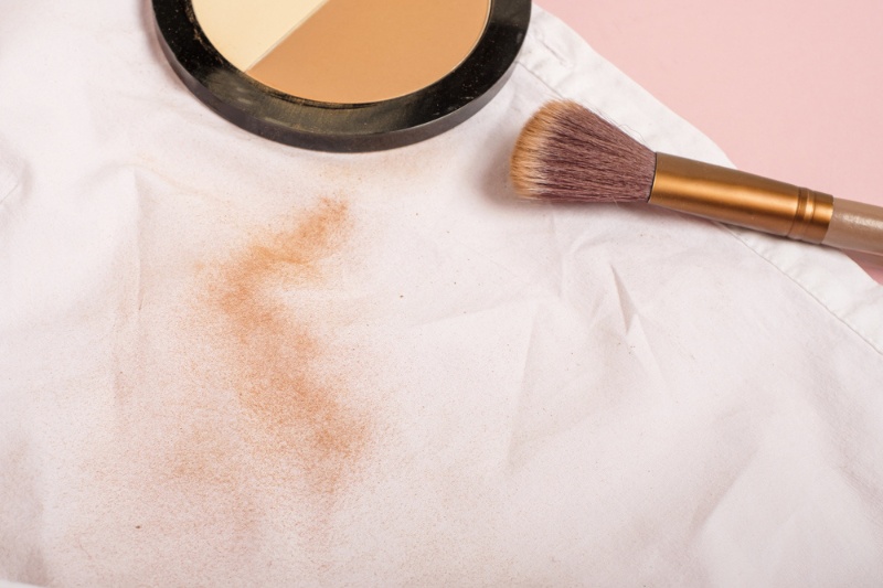 powder foundation on clothes