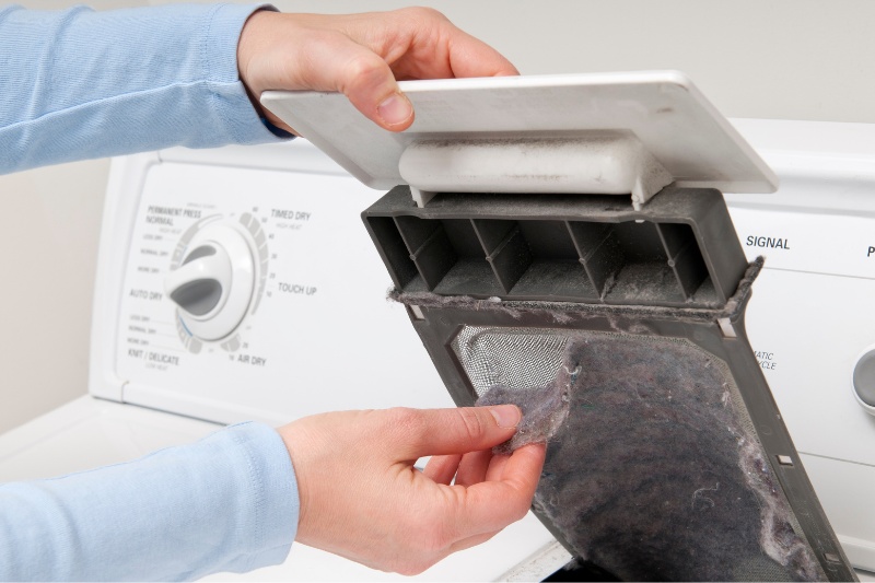 removing lint from tumble dryer