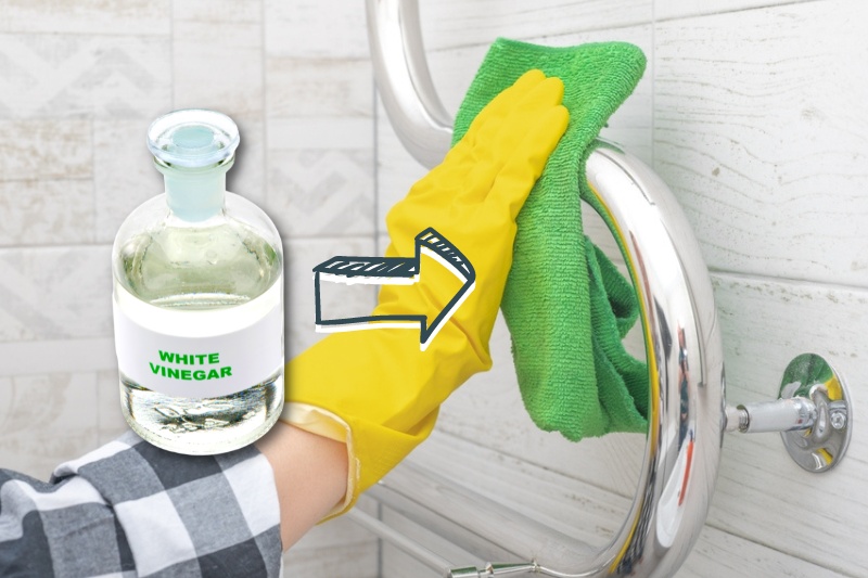 wiping chrome towel rail with white vinegar